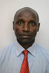 About Us Rev. Kigen Kipchirchir Benard
